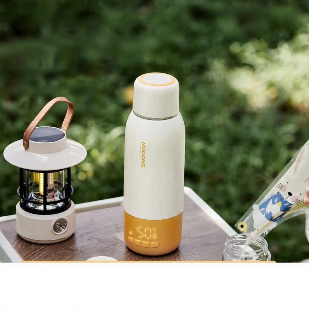 Bærbar elektrisk vandvarmekop til babymælk, 550ml